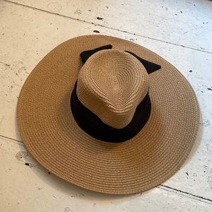 Saks Fifth Avenue sun hat with black ribbon.